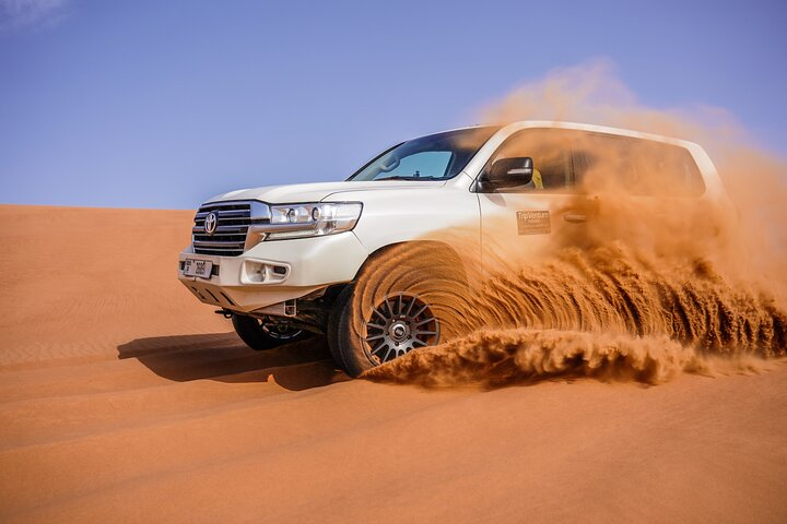 Feel the rush as you conquer the endless dunes in a 4x4 creating unforgettable memories against the backdrop of the stunning desert landscape. Experience adventure like never before.